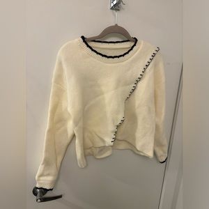 Sweater with stitches